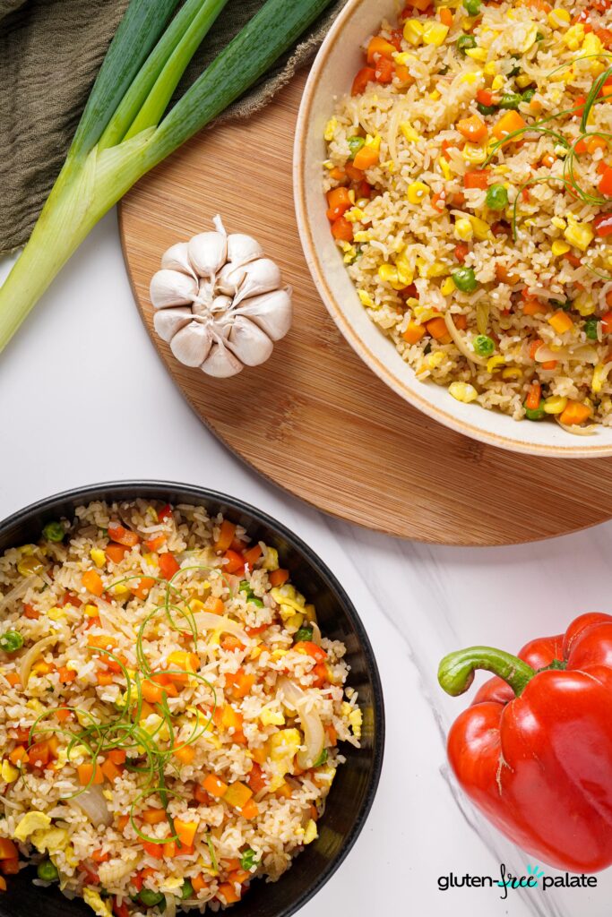 Gluten-free fried rice in a black bowl.