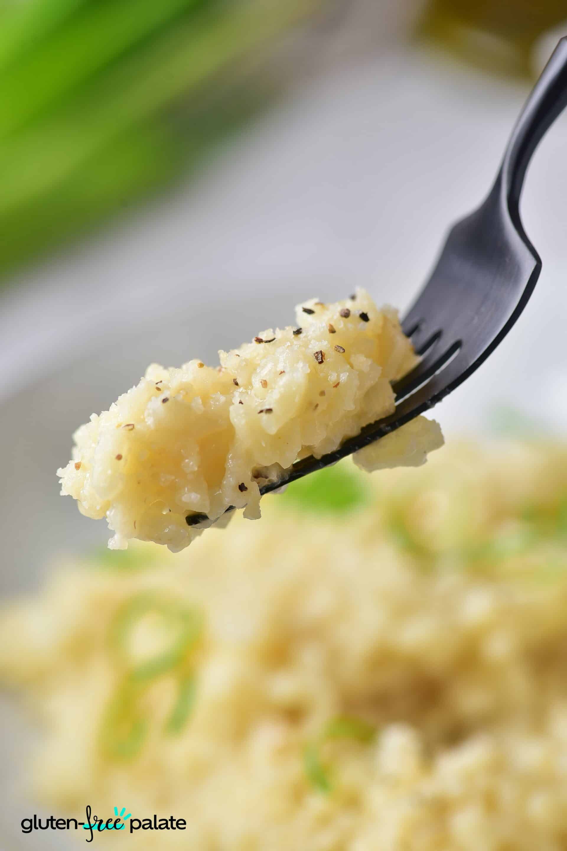 Gluten-Free Risotto on a black fork.