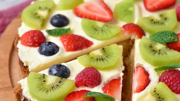 Gluten-Free Fruit Pizza close up view of a slice.
