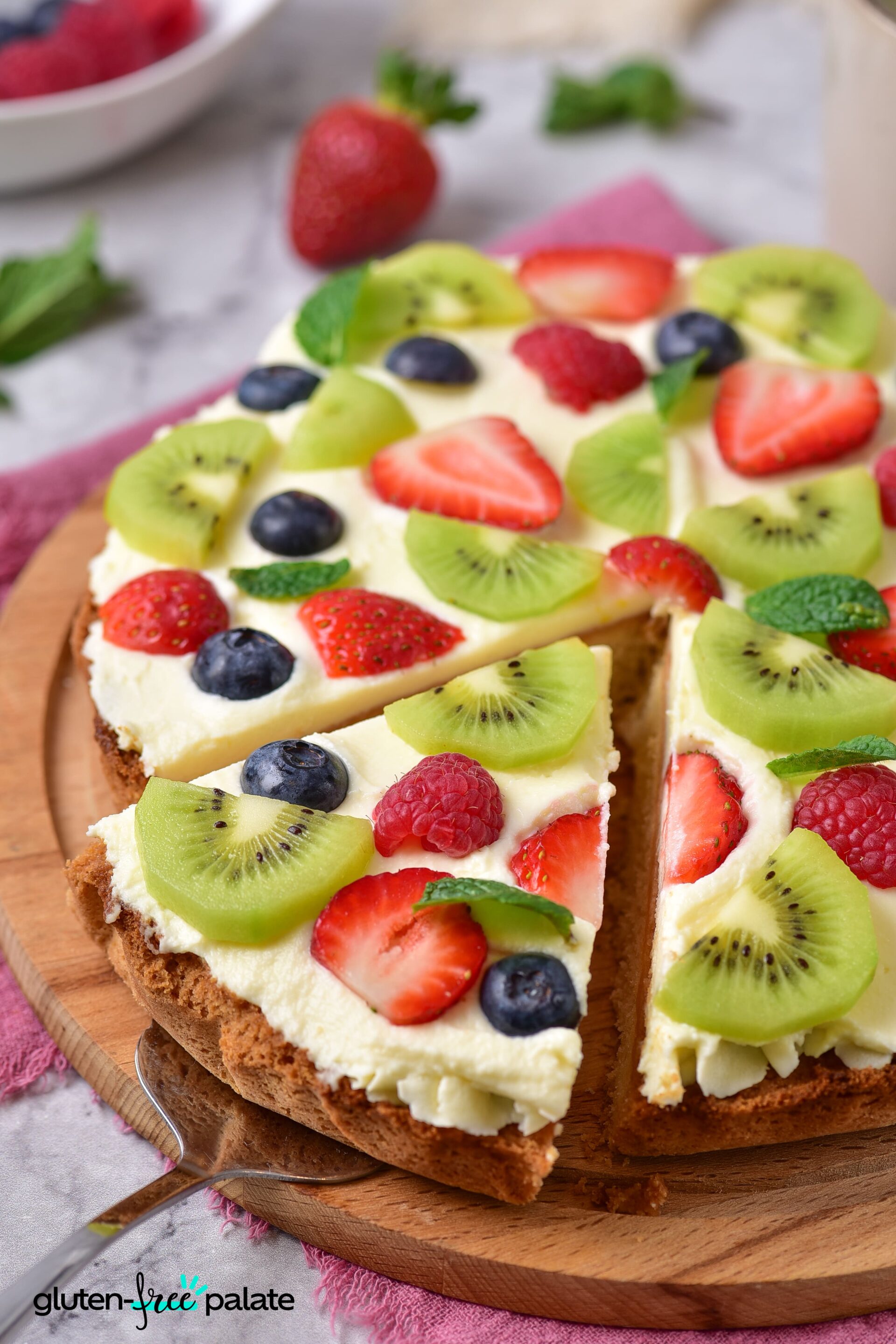 Gluten-Free Fruit Pizza close up view of a slice.