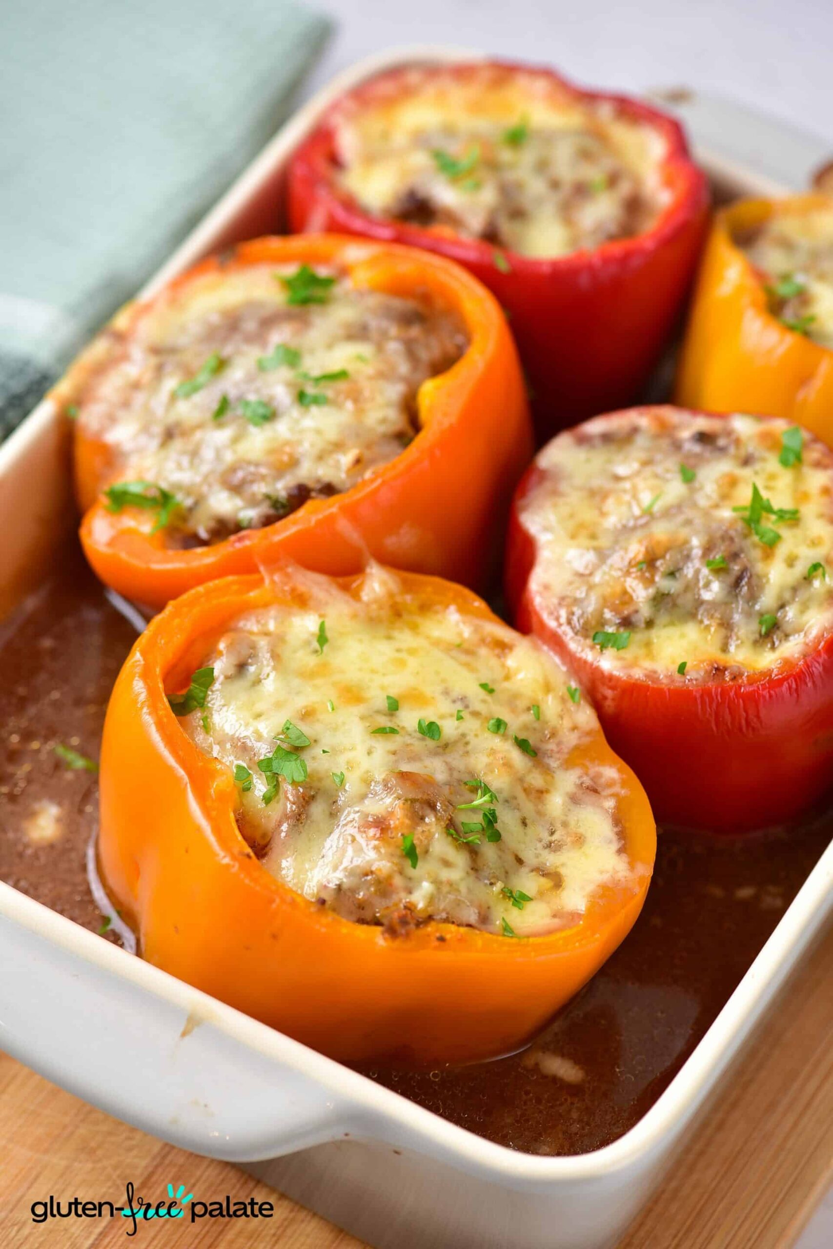 Gluten-Free Stuffed Peppers in a white baking dish.