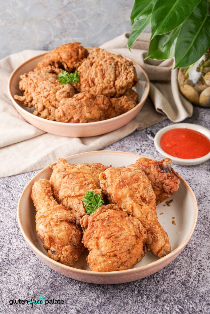 Gluten-Free Fried Chicken served in plates with dipping sauce.