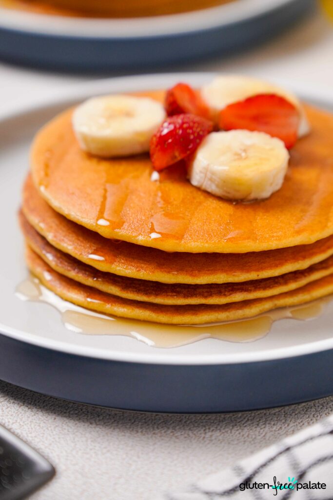Gluten-Free Protein pancakes on a white plate.