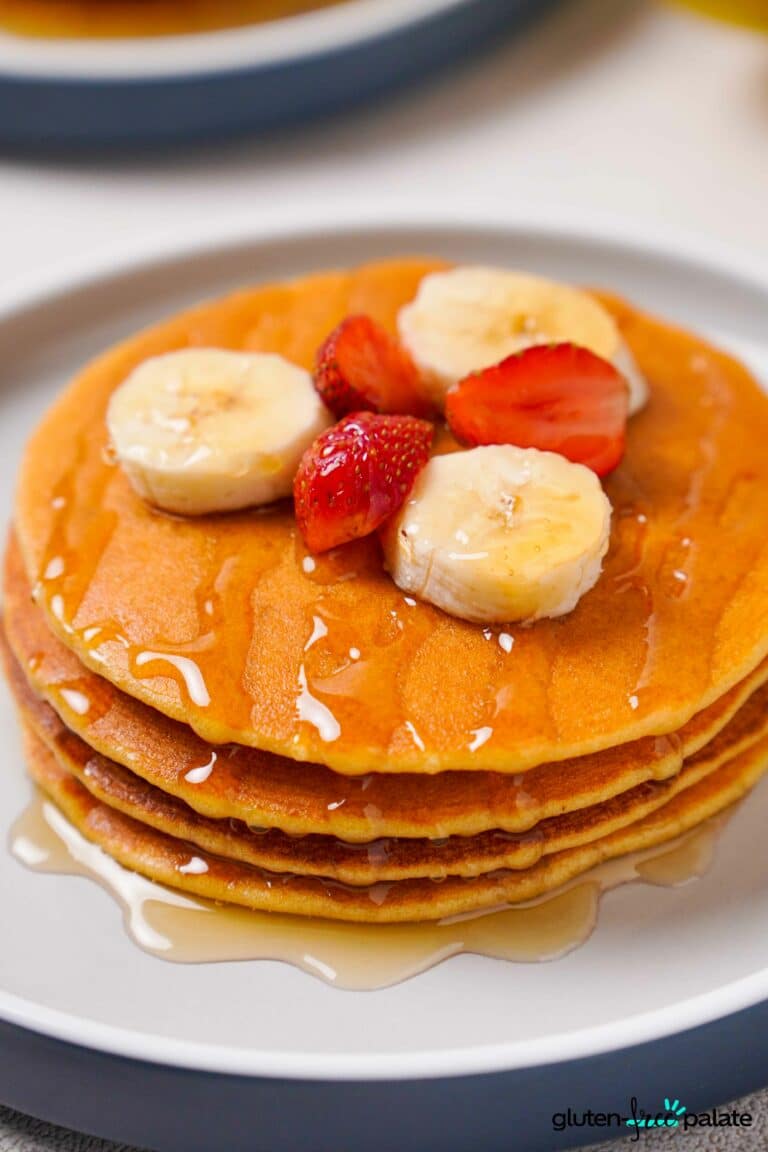 Top down view of Gluten-Free Protein pancakes on a white plate.