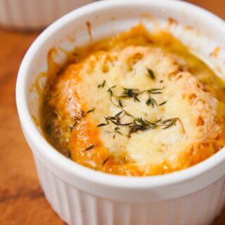 Gluten-Free French onion soup in a white ramekin.