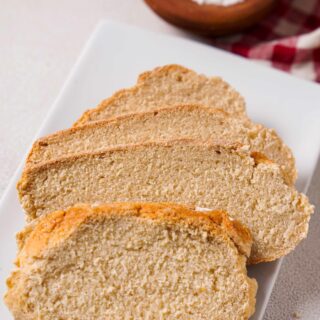 Close up view of Gluten-free Artisan bread on a white plate.