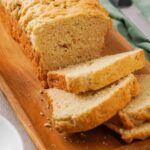 Close up view of slices of Gluten-Free Brioche on a bread board.
