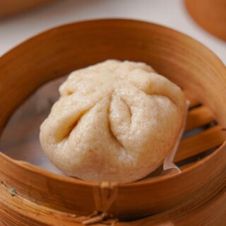 Gluten-Free Bao Bun in a steamer basket.