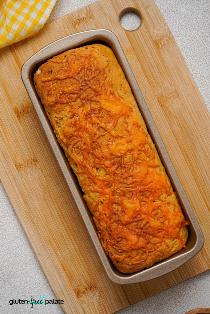 Gluten-Free Cheese Bread in a loaf pan.