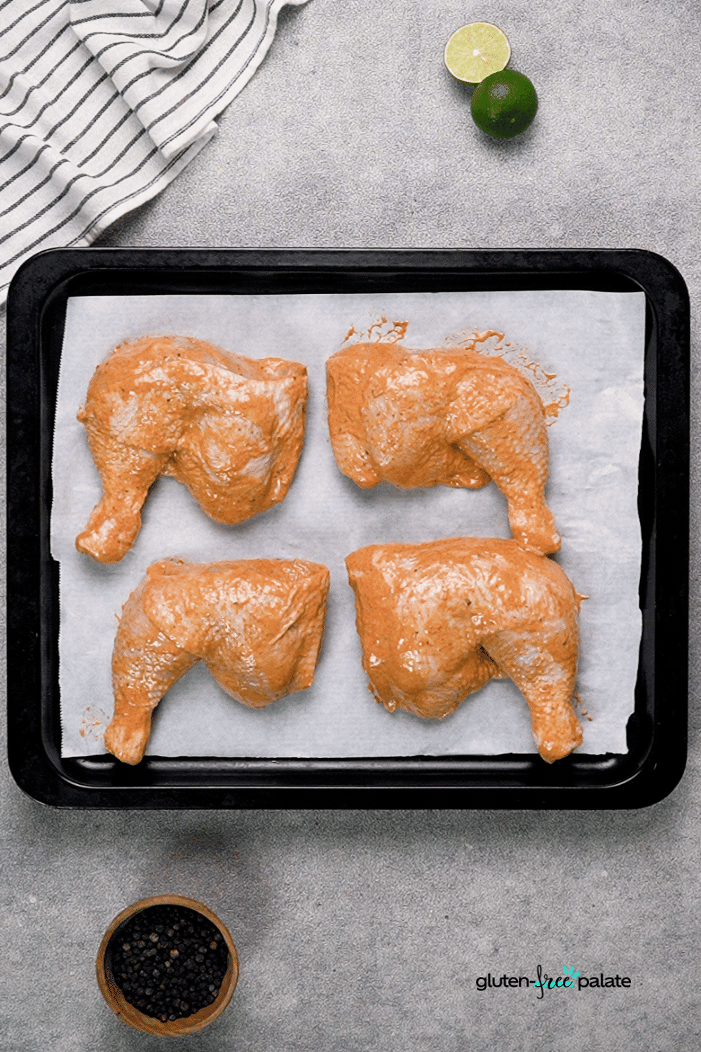 Add the marinaded tandoori chicken legs to the baking sheet. Then bake it for 20 minutes.