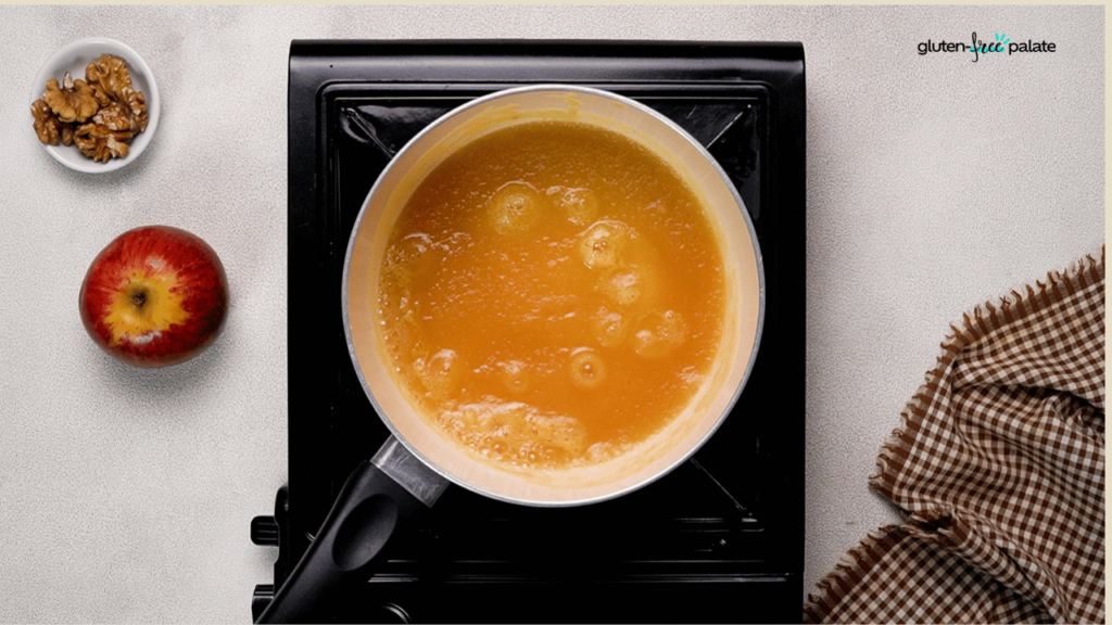 Cook the applesauce.