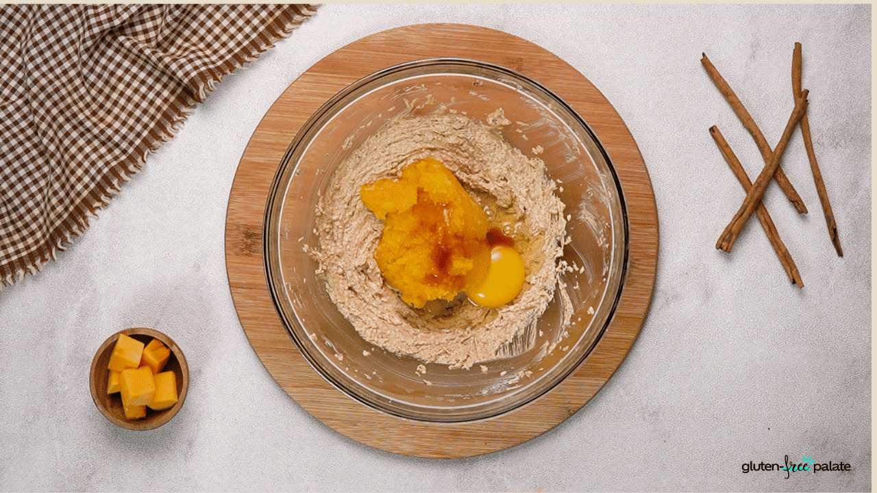 Step 2: Add pumpkin to the mixing bowl.