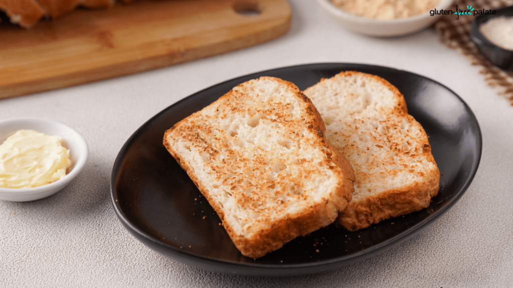 Two slices of toasted gluten free bread with butter.
