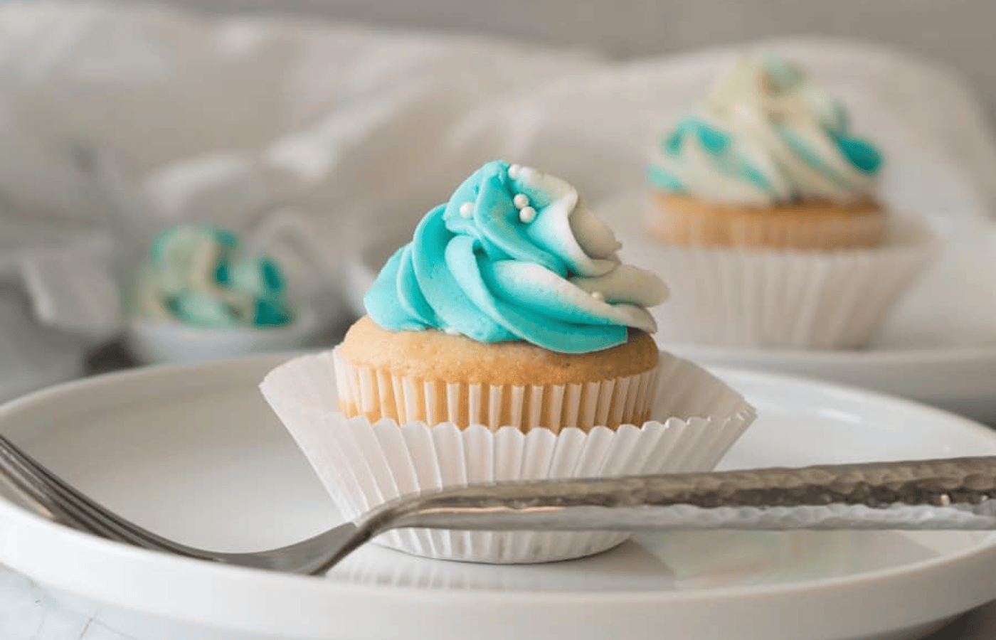 Gluten free vanilla cupcakes made with an easy recipe from GlutenFreePalate.