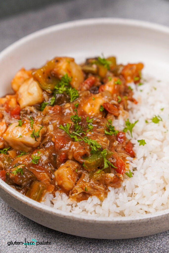 Close up of seafood gumbo with crab, shrimp and fish.