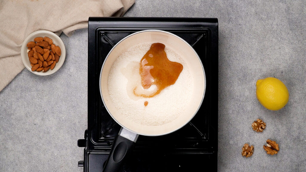 Making the syrup in a pot.