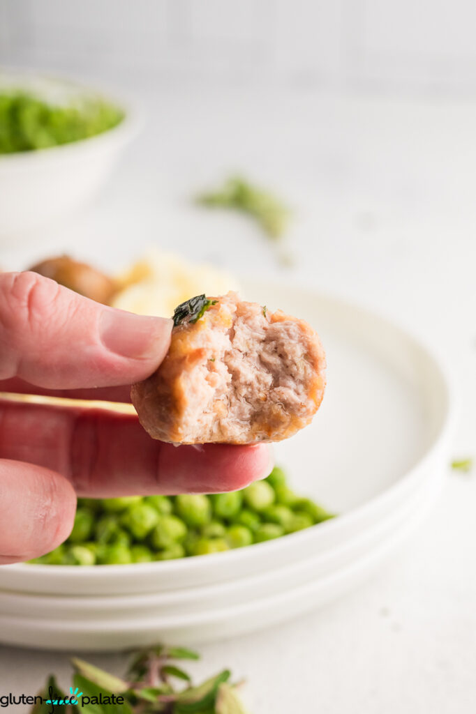 A meatball with a bite out of it.