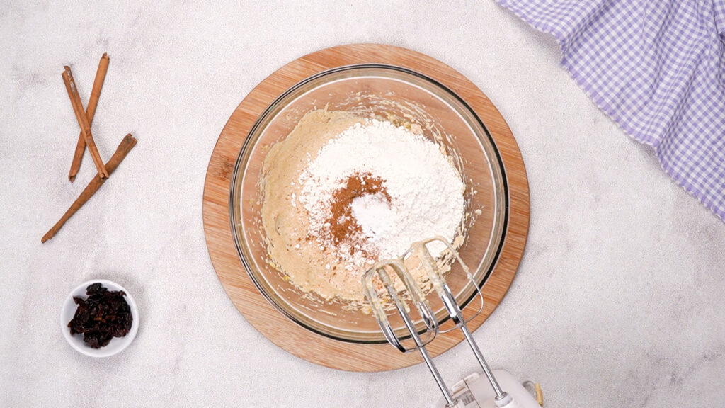 Gluten-free flour, cinnamon, baking soda, and salt have been added to the batter.