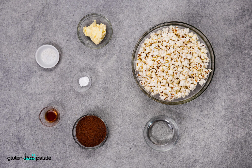Ingredients for gluten-free caramel corn include popcorn, brown sugar, butter, baking soda, and a bit of vanilla.