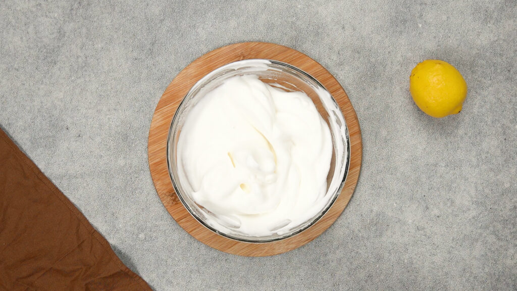 Fully mixed cloud bread base after folding in cornstarch, smooth and airy, prepped for dividing and coloring.