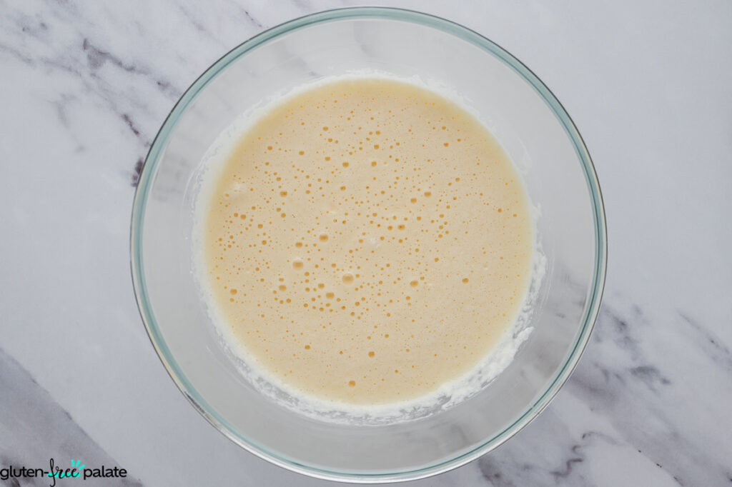 Mochi waffle batter after folding in whipped egg white, smooth and slightly airy.