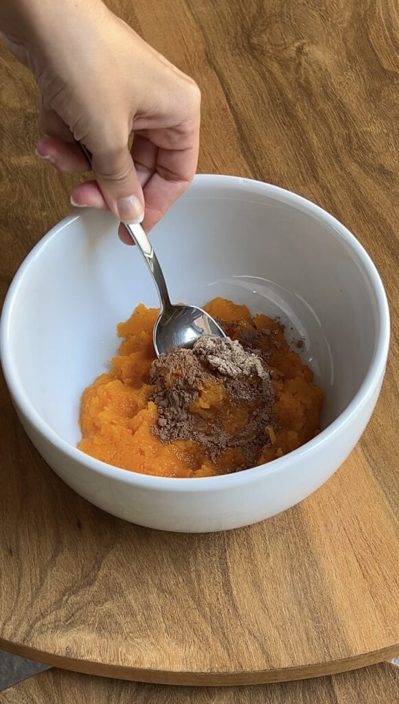 Gluten-free cheesecake bites filling being mixed.