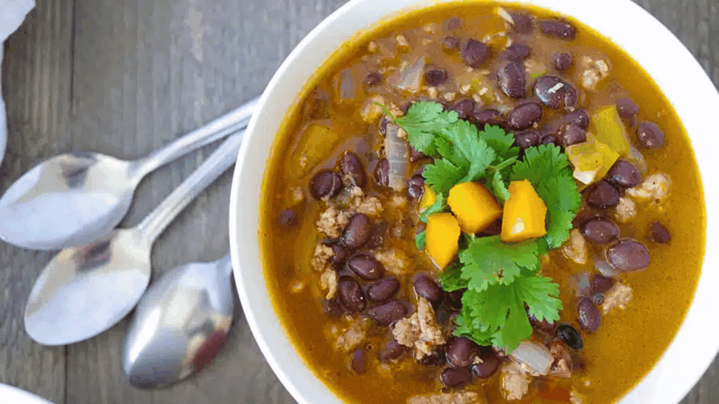 A bowl of celiac-safe black bean soup, a high-fiber gluten-free meal option