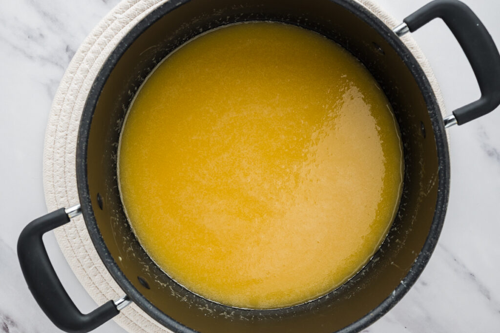 Milk and sugar mixture in a pot.