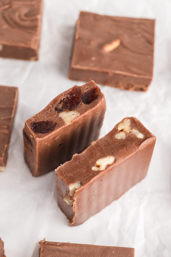 Two slices of fantasy fudge standing on their sides, the tops showing.