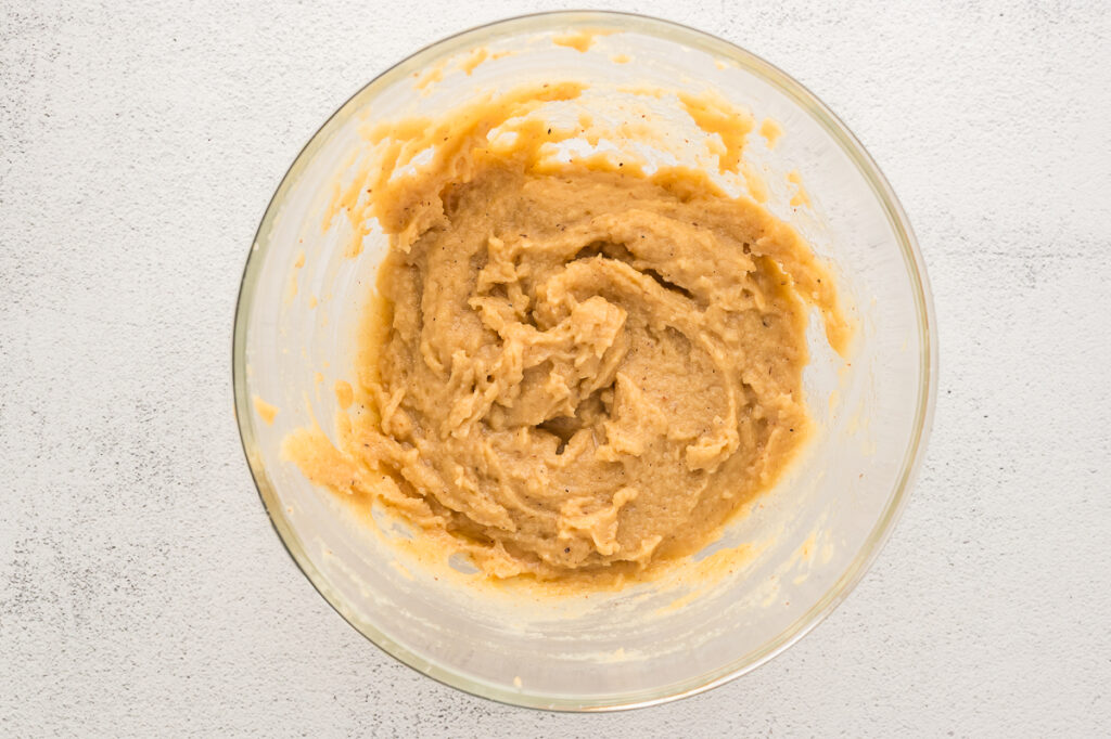 Adding almond flour, baking soda, and salt to the wet ingredients