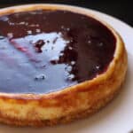Gluten-Free Blueberry Cheesecake on a white plate.