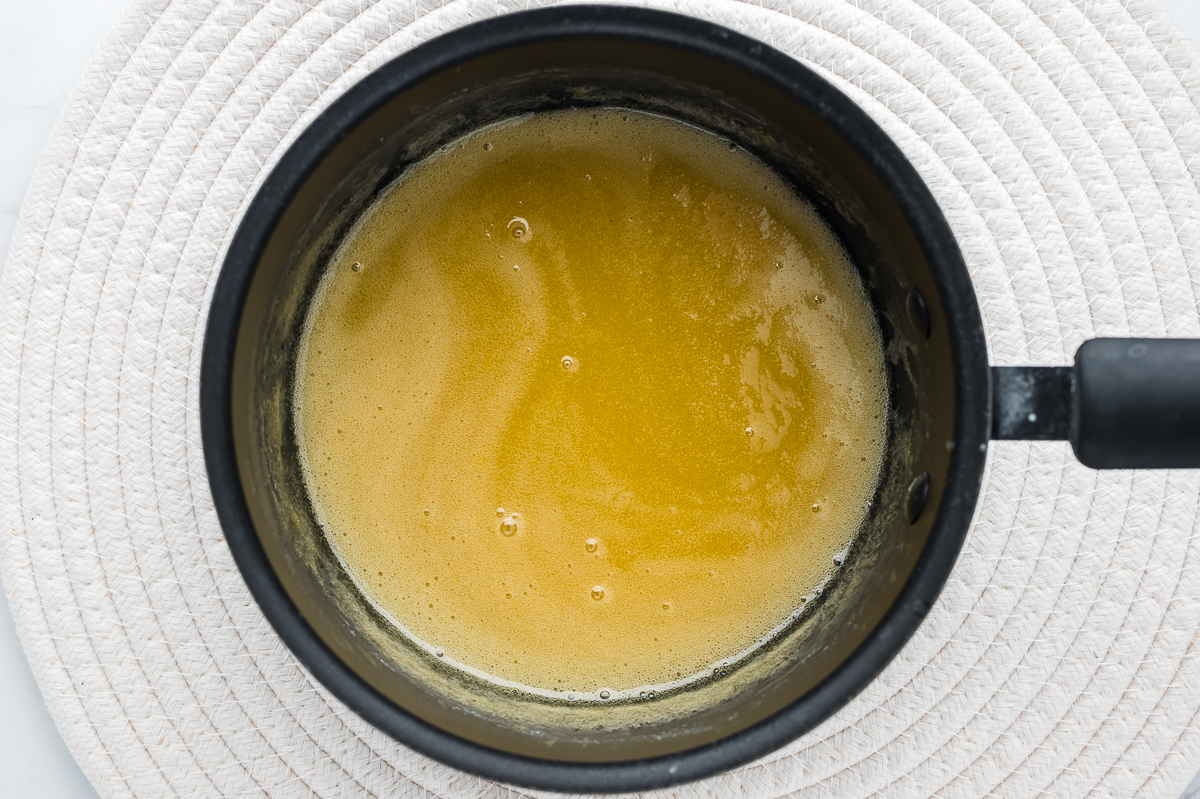 A bowl of the lemon curd ingrdients before adding butter.