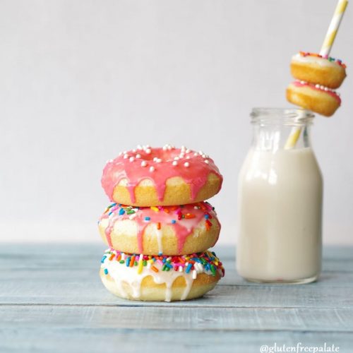 three gluten free vanilla donuts stacked